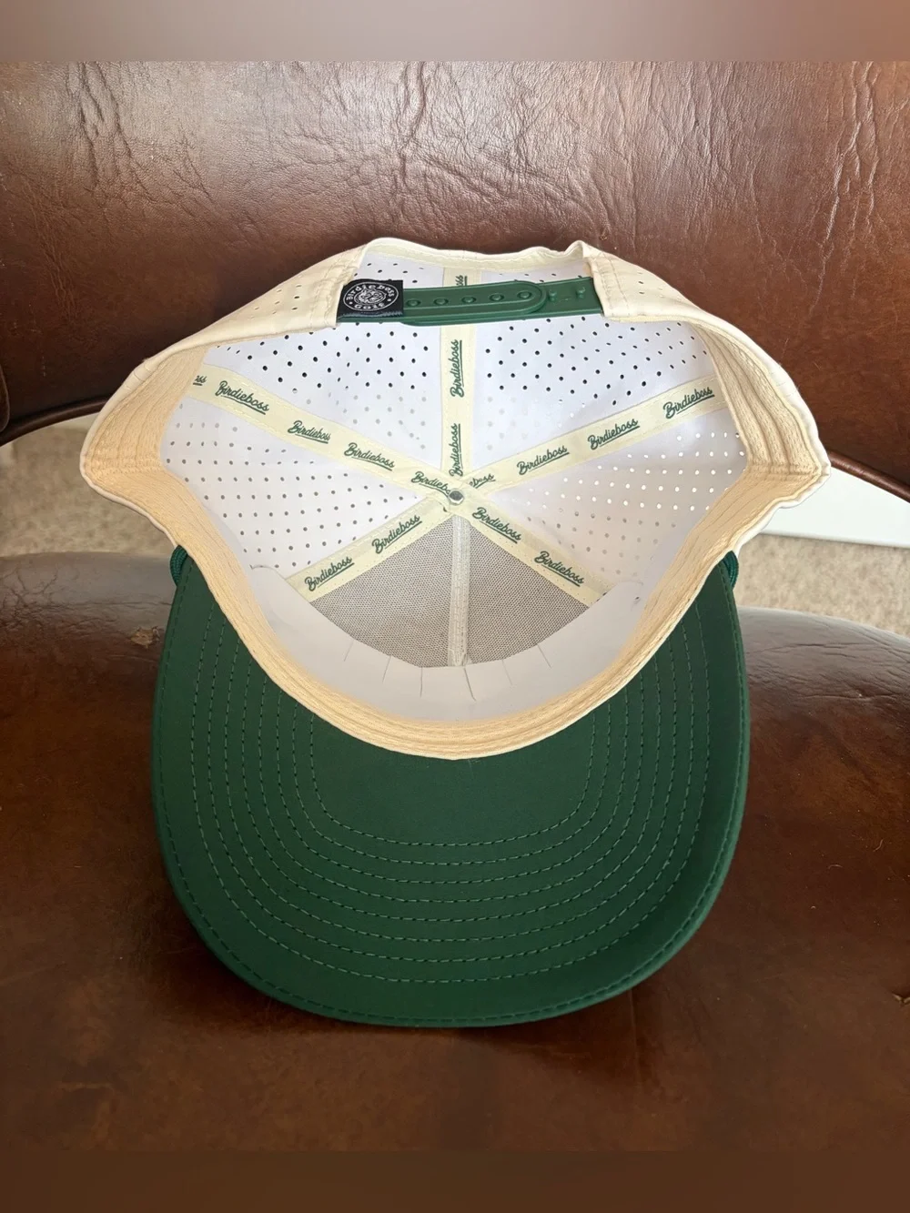 Birdieboss DILF trucker hat features a white crown, a green visor Adjustable